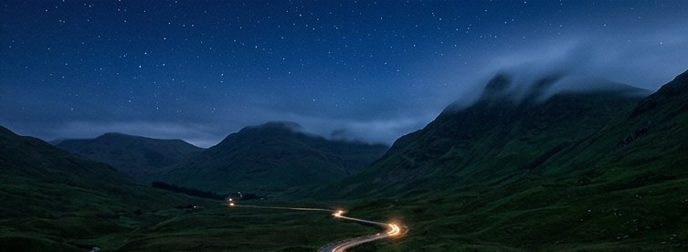 A winding road through the Kerry mountains at night